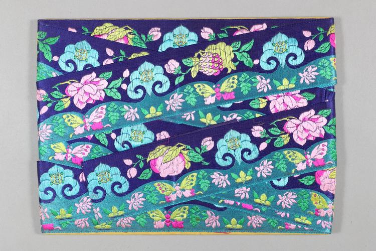 宝蓝色缎地牡丹石榴桃云头纹绦