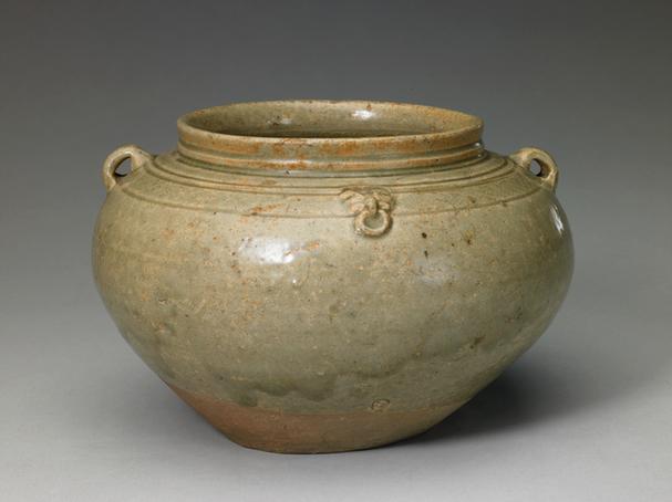 青釉印网格纹双系罐