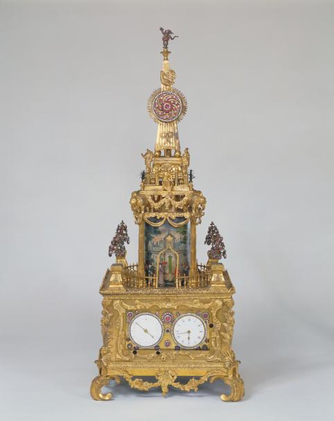 铜镀金四柱亭式跑人转花钟