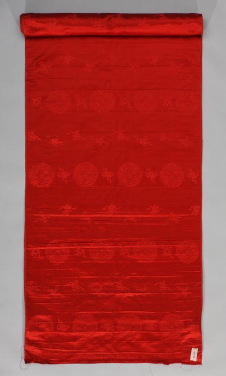 枣红色团龙杂宝纹暗花缎