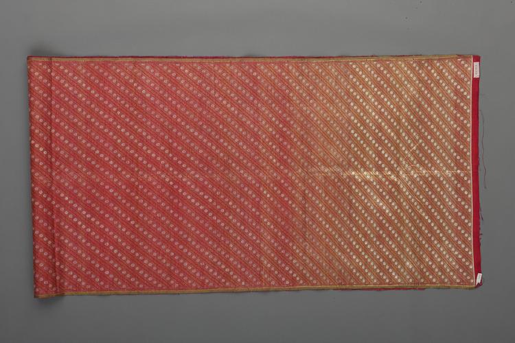 紫红色地小团花斜纹回回织银锦