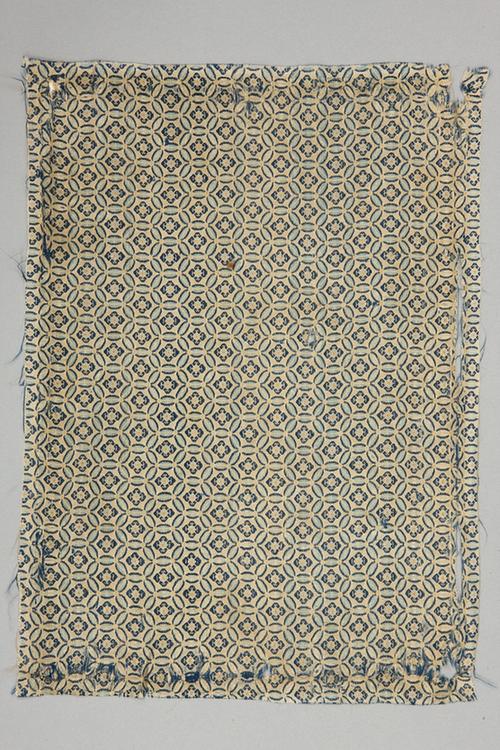 驼色地古钱四合如意纹锦