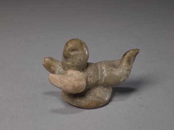 石湾窑青釉卧人像