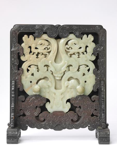 紫檀木雕花边座嵌玉璧插屏