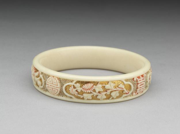 雕象牙贴金四季花卉镯