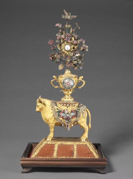 铜镀金牛驮瓶花表