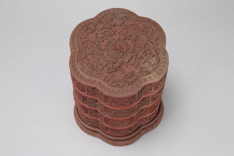 剔红五蝠捧寿纹开光花卉纹梅花式三层套盒