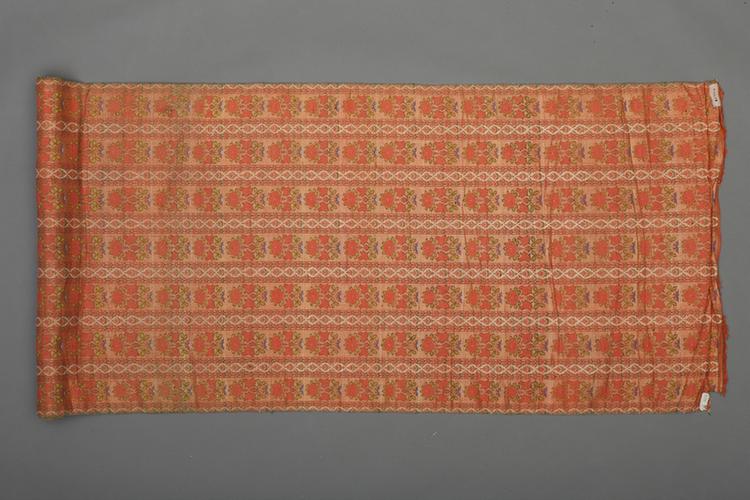 杏黄色地折枝花条纹回回织金锦