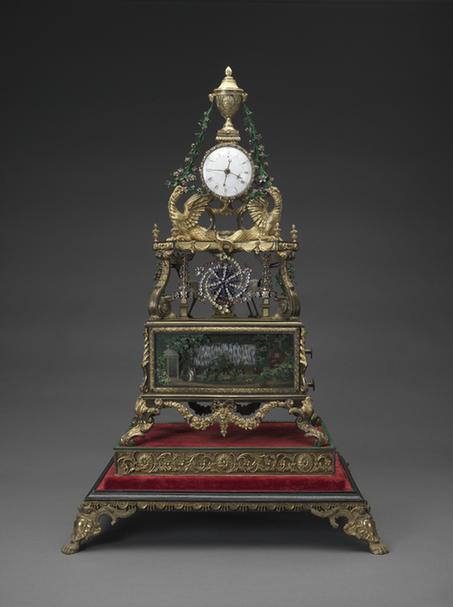 铜镀金嵌料石花转水法跑人上顶瓶式规矩钟