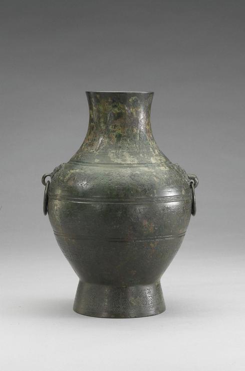 战国 三角云纹壶