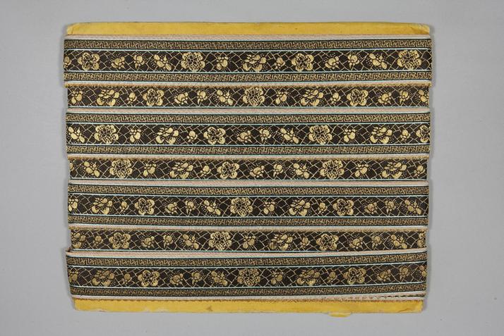 元青色缎地织金冰梅纹绦