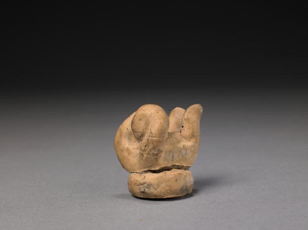 石湾窑黄釉卧人像