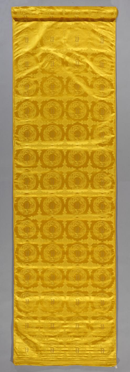 明黄色团龙滿文字纹织金缎