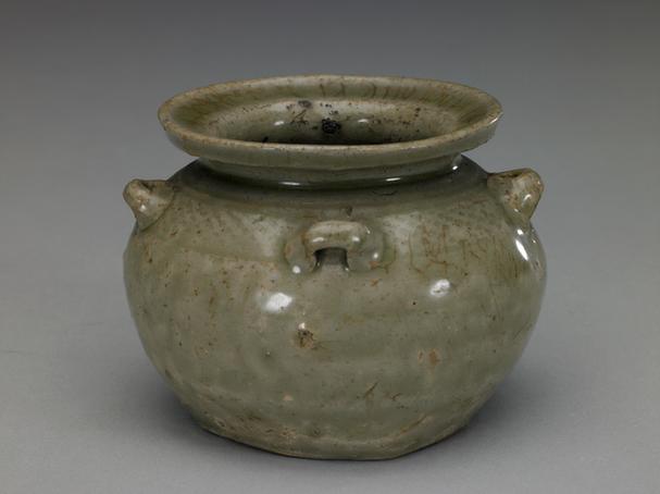 青釉印网格纹四系小罐