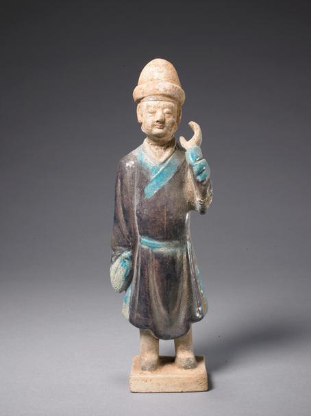陶紫绿釉男立俑