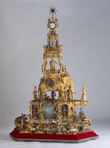 铜镀金象驮转花钟