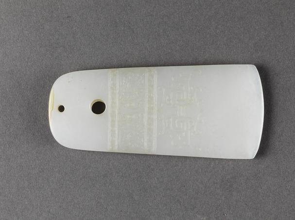 白玉人面鸟兽纹斧