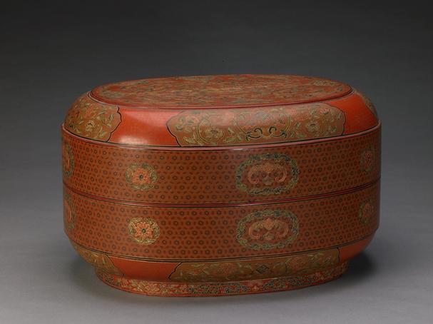 乾隆款戗金彩漆缠枝莲云蝠纹椭圆盒