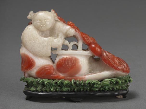 玛瑙扶花篮童子