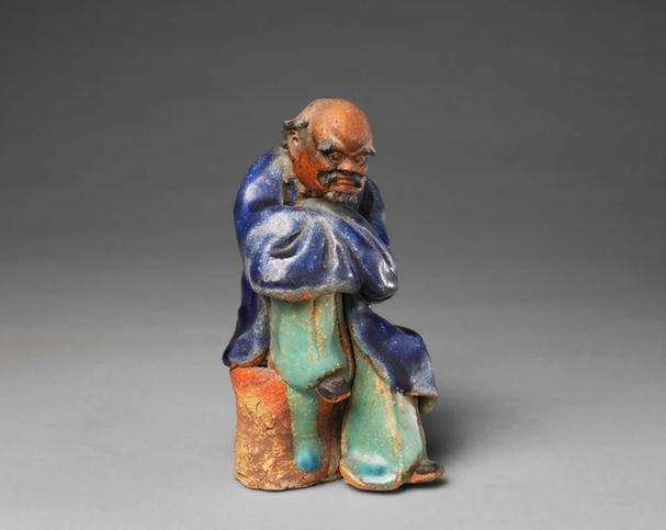 石湾窑蓝绿釉抚膝罗汉坐像