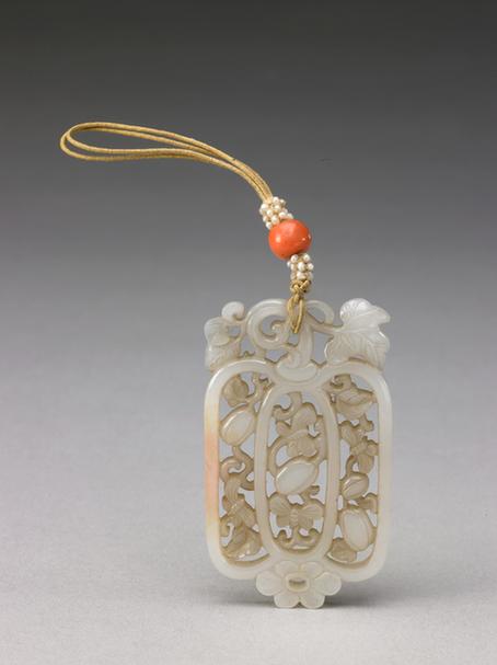 乾隆款白玉雕瓜蝶佩