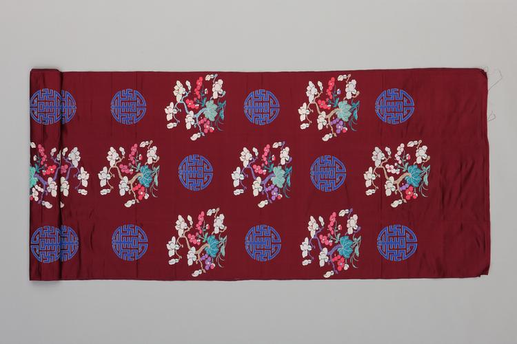 绛色玉兰海棠寿字纹妆花缎袍料