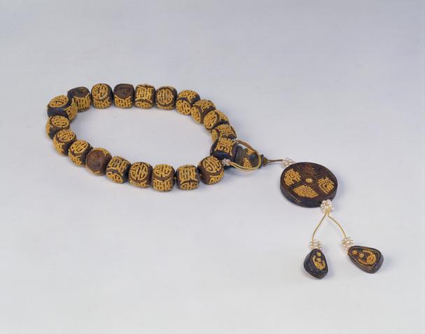 伽南香嵌金长圆寿字纹十八子手串