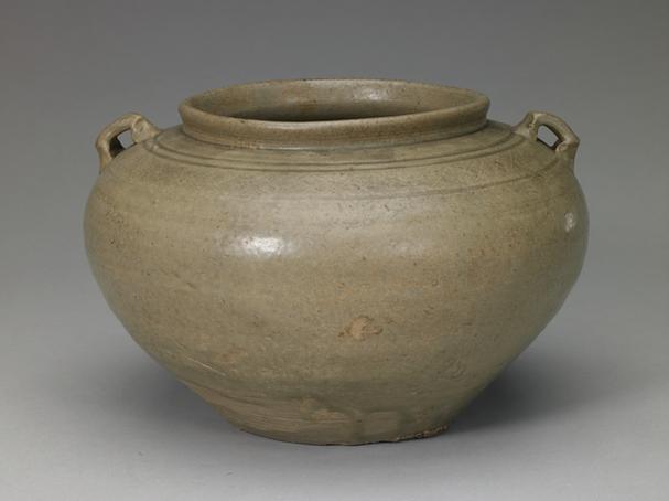 青釉印网格纹双系罐