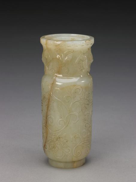 青玉浮雕双龙缠枝牡丹寿字兽耳圆瓶