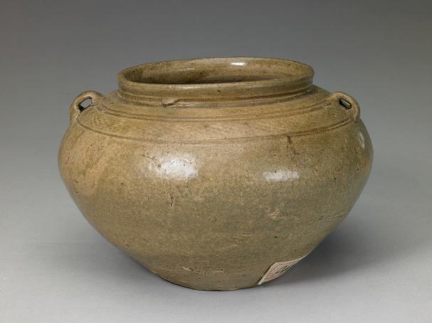 青釉印花双系罐