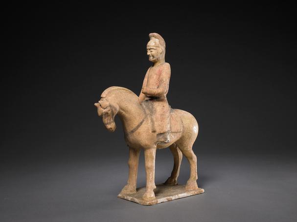 陶黄釉骑马男俑