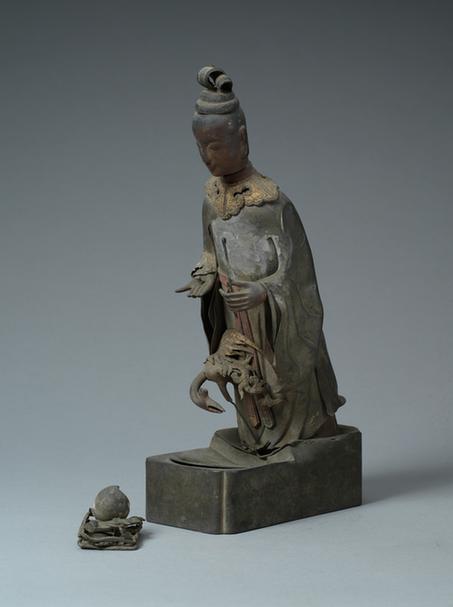 铅持蟠桃仙人立像