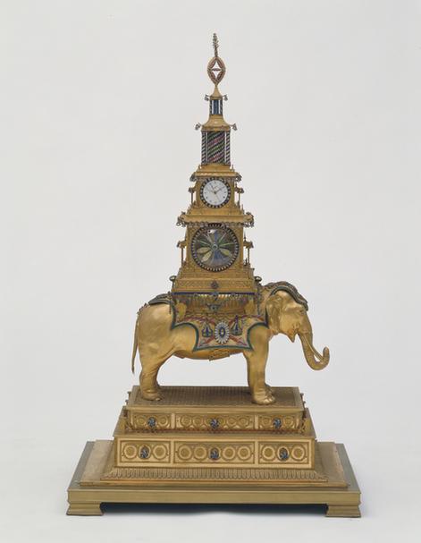 铜镀金象驮宝塔变花转花钟