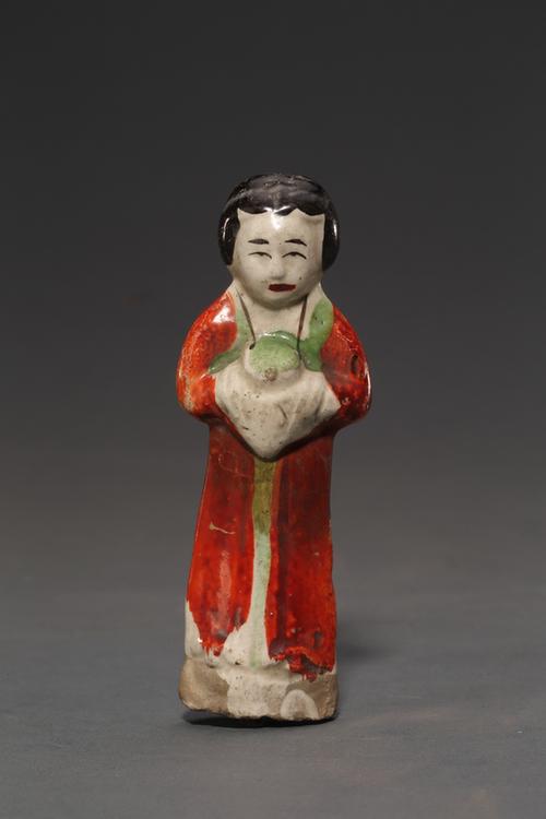 白釉瓷加彩捧物女人像