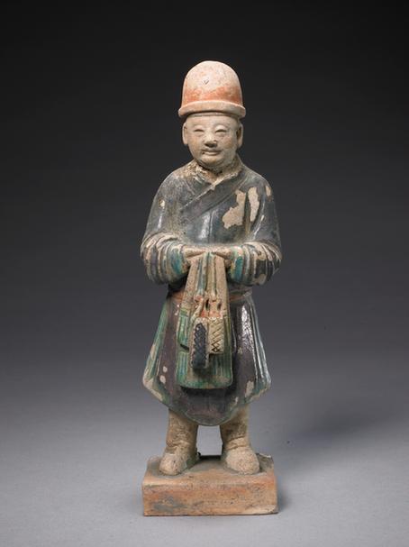 陶紫绿釉男立俑