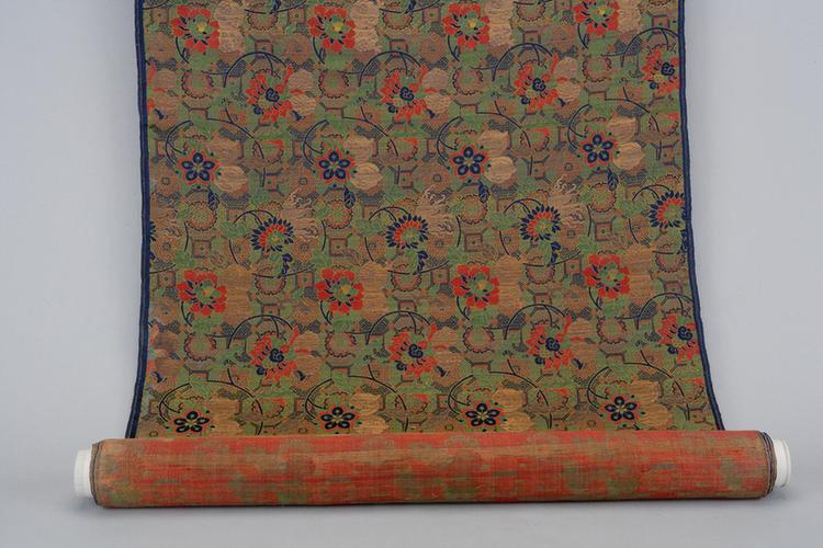 蓝色地三多龟背纹锦