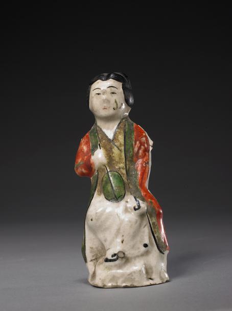 白釉加彩瓷女人像