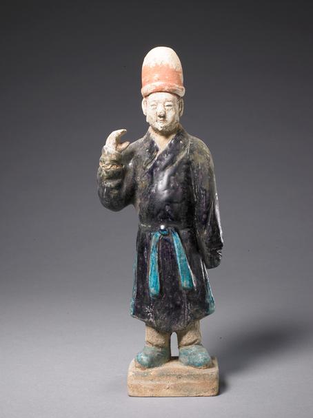 陶紫绿釉男立俑