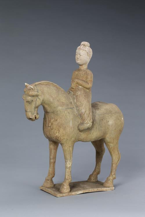 陶黄釉骑马女俑