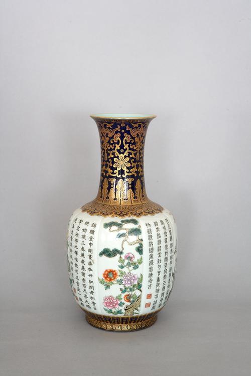 乾隆款祭蓝釉开光花卉诗句瓶