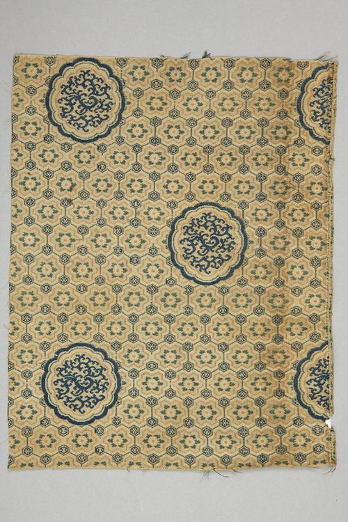 彩色团夔龙朵花龟背纹锦