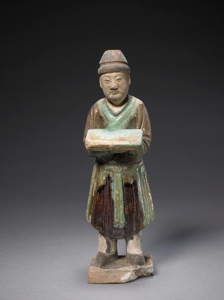 陶孔雀绿加紫釉男立俑