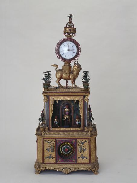 铜镀金仙猿献寿麒麟驮钟