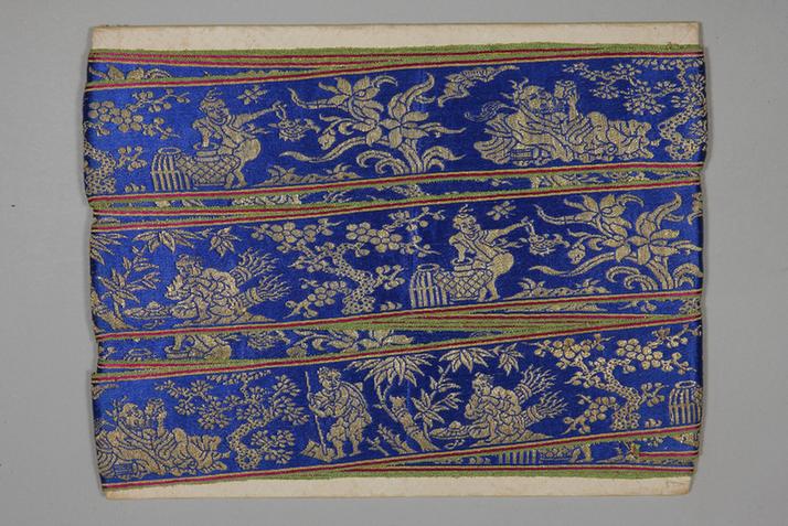 品蓝色缎地织金岁寒三友纹绦