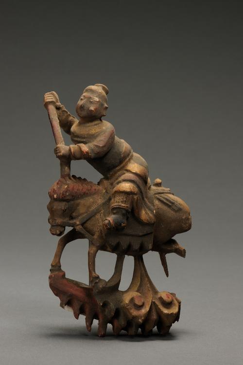 木雕镂空彩绘骑马人像