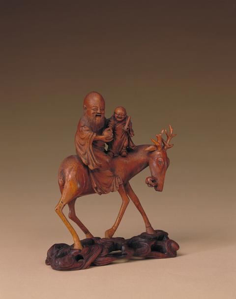 张宏裕款竹根雕骑鹿寿星