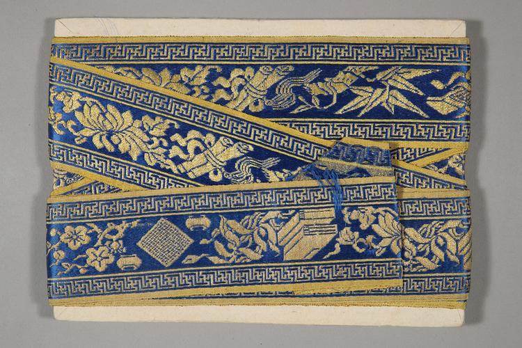 品蓝色缎地织金琴棋书画梅兰竹菊纹绦