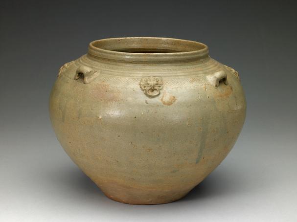 青釉印纹四系罐