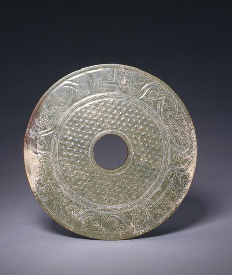 青玉兽面蒲纹璧