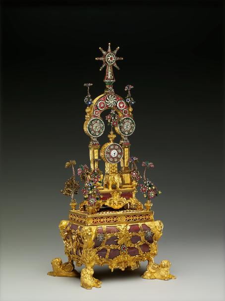 铜镀金镶玛瑙乐箱牌楼式象驮转花钟